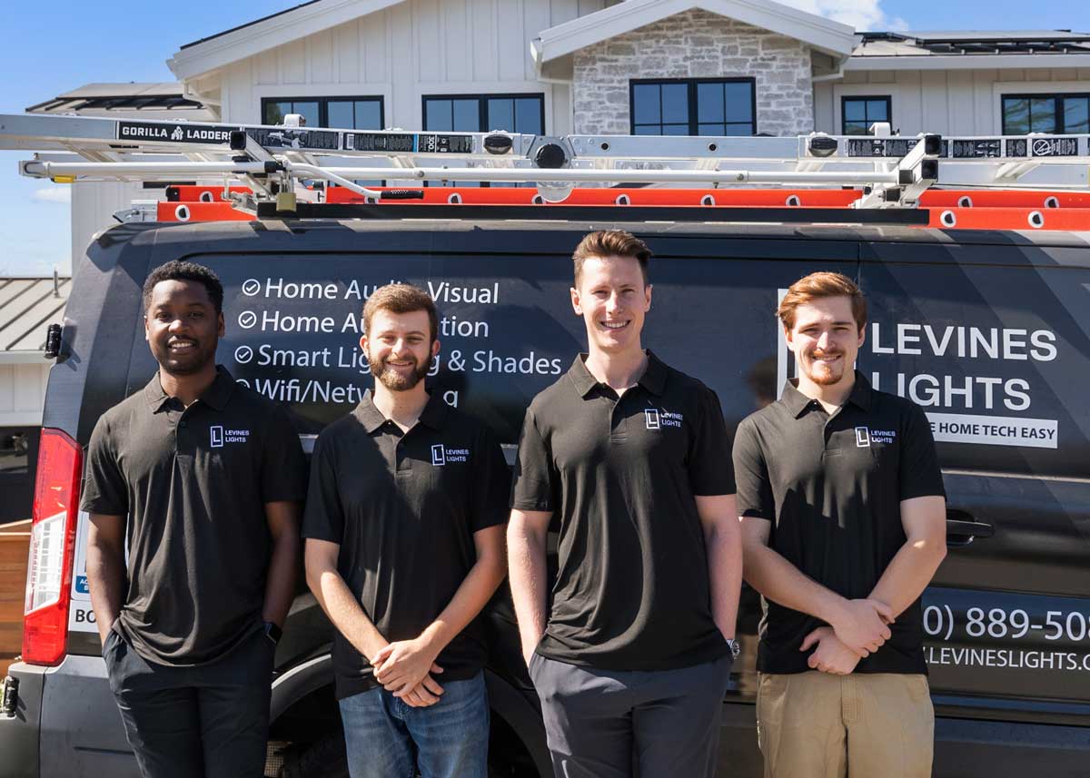 The Levines Lights team in front of the company van.