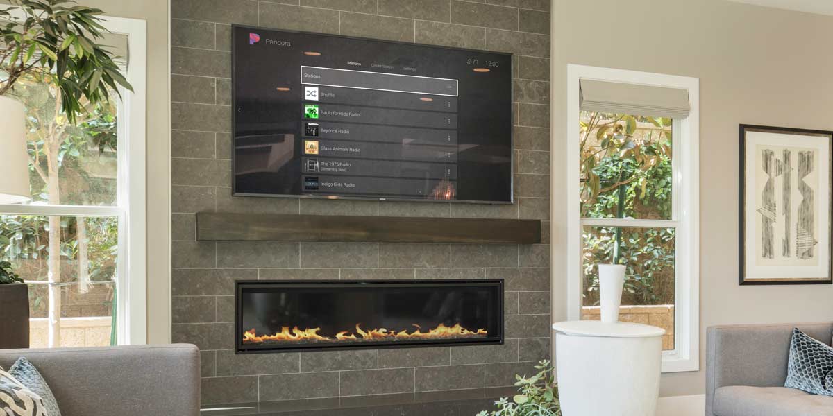 Living room with streaming TV and fireplace.